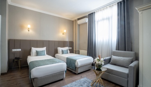 Habitación estándar con 1 cama doble o 2 individuales