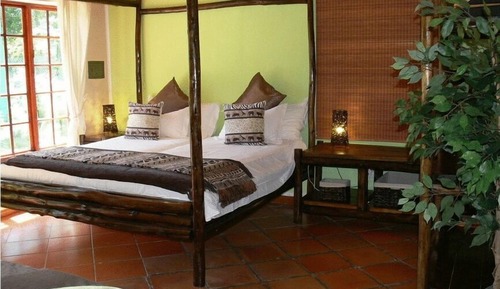 Suite Deluxe, varias camas, chimenea, vistas al jardín