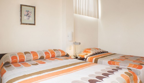 Habitación familiar con 2 camas individuales