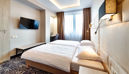 Habitación superior con 1 cama doble o 2 individuales