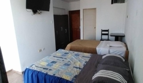 Habitación superior, varias camas, vistas a la ciudad