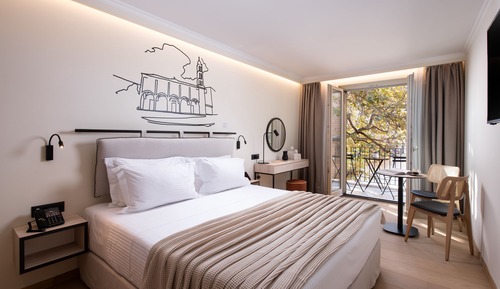Habitación superior con 1 cama doble o 2 individuales, vistas a la ciudad