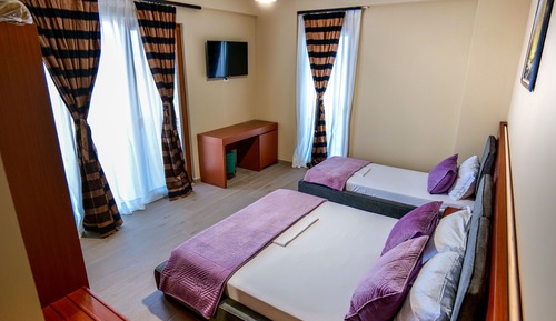 Habitación triple, vistas al mar