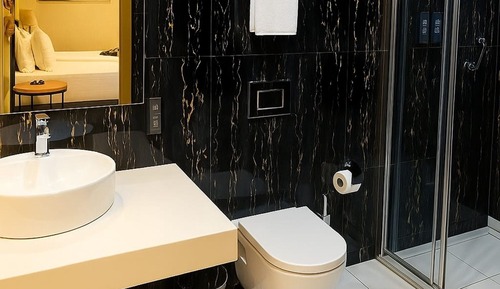 Habitación estándar con 1 cama doble o 2 individuales, planta baja
