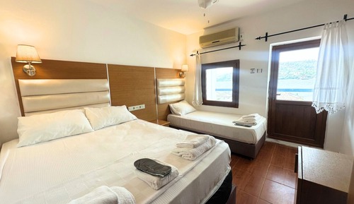 Habitación triple Deluxe, vistas al mar
