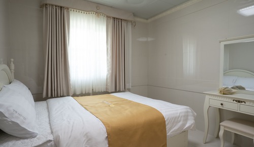 Habitación estándar con 1 cama doble o 2 individuales