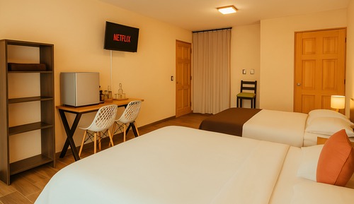 Habitación cuádruple de lujo, varias camas, Aire acondicionado, vistas a la ciudad