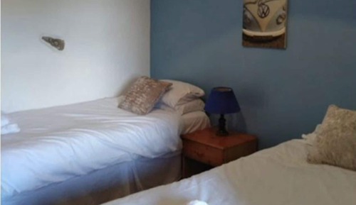 Habitación Confort con 1 cama doble o 2 individuales