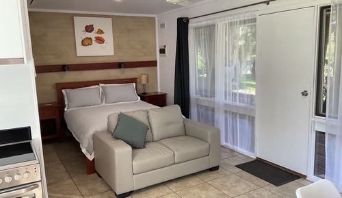 Suite estudio Deluxe, varias camas, cocina, vistas al jardín