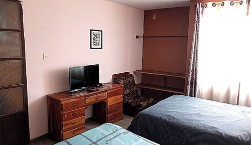 Habitación clásica con 2 camas individuales