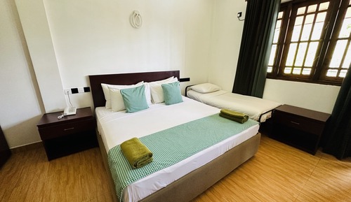 Habitación triple Deluxe