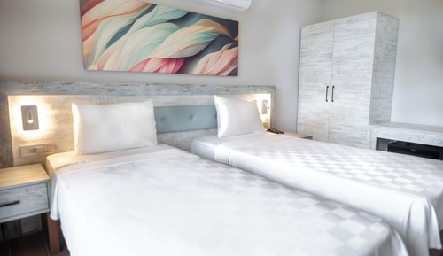 Habitación estándar con 1 cama doble o 2 individuales