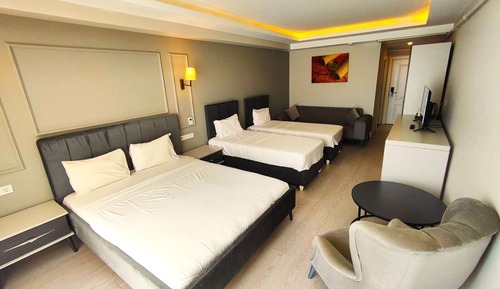 Habitación cuádruple Deluxe