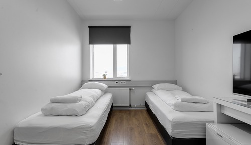 Habitación clásica con 2 camas individuales, baño compartido