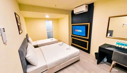 Habitación triple Deluxe
