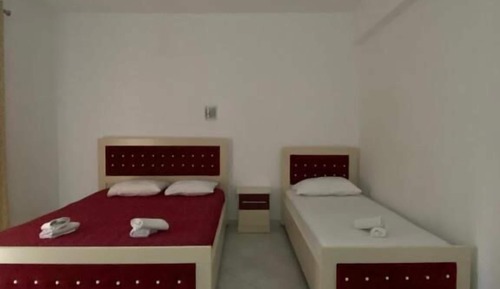 Habitación triple, vistas al mar