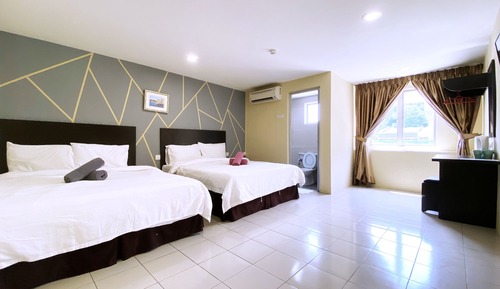 Habitación cuádruple Deluxe
