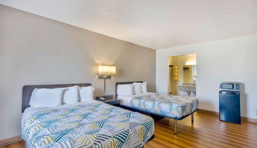 Suite estándar, 2 camas dobles, no fumadores, cocina básica