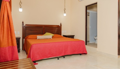 Habitación triple Deluxe, no fumadores, vistas al jardín