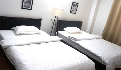 Habitación ejecutiva con 2 camas individuales