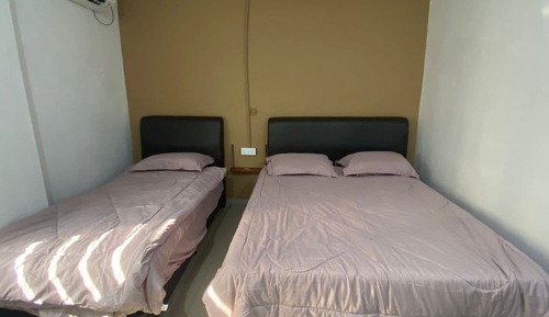 Habitación triple Deluxe