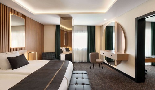 Suite junior, 1 cama de matrimonio grande, vistas a la ciudad