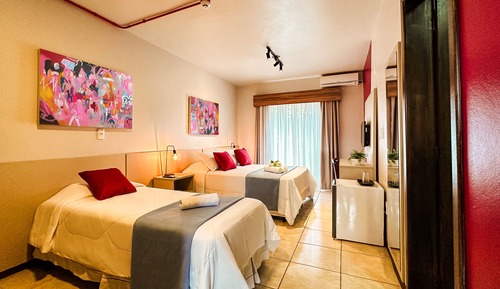 Habitación Deluxe, varias camas