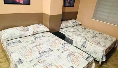 Habitación Deluxe, varias camas