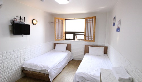 Habitación con 2 camas individuales