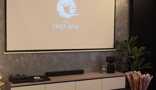 Elegant Seaview Projector Lounge by The Only Bnb