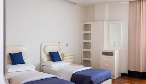 Habitación Business con 1 cama doble o 2 individuales
