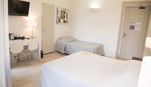Habitación familiar, varias camas