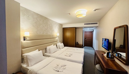 Habitación triple Deluxe