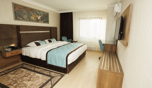 Habitación Deluxe con 1 cama doble o 2 individuales