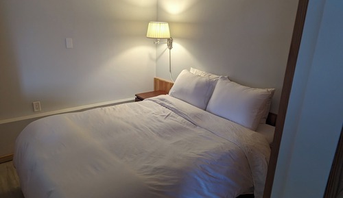Suite, varias camas, cocina básica, vistas al mar