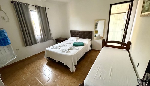 Habitación triple estándar, 1 habitación, vistas al jardín