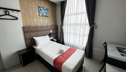 Habitación individual, sin ventanas