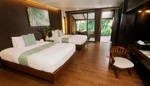 Habitación, en la zona del jardín (Dakak)
