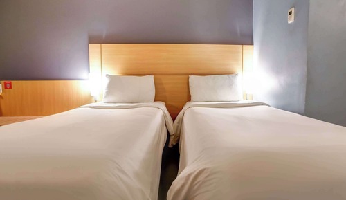 Quarto Standard com Cama de Casal e 1 Cama Extra para Criança