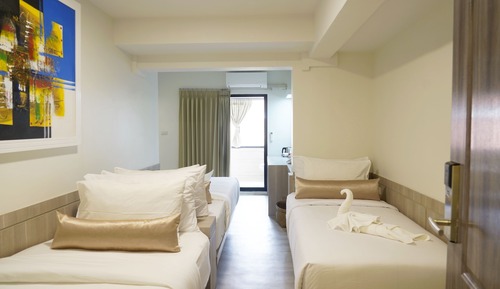 Habitación triple Deluxe (with Window)