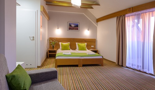 Habitación triple ejecutiva, 1 cama doble con sofá cama