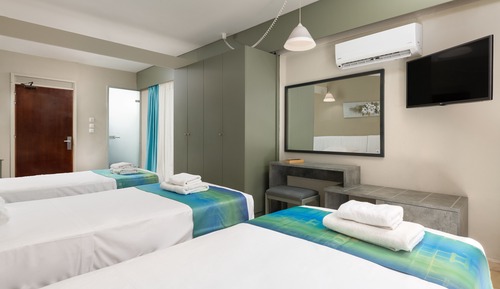 Habitación triple, vistas al mar