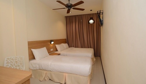 Habitación triple Deluxe