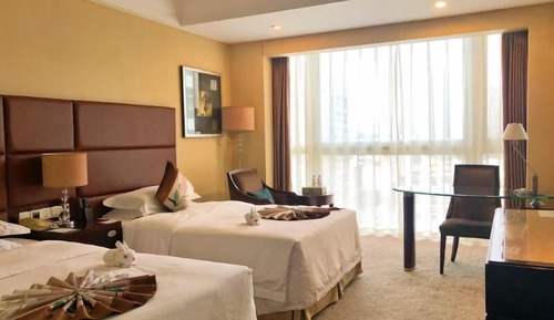 Habitación Deluxe, varias camas