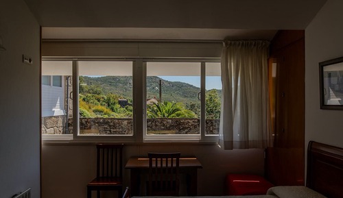 Habitación triple, vistas a la montaña