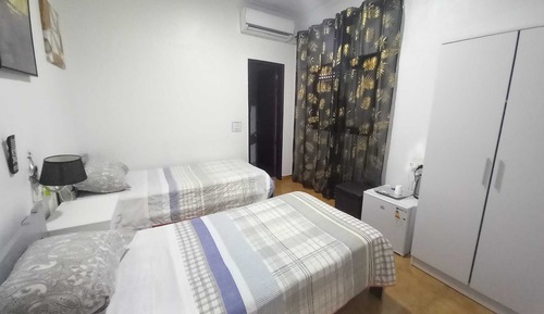 Habitación clásica con 2 camas individuales