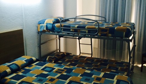 Habitación Cuádruple (2 adultos y 2 niños)