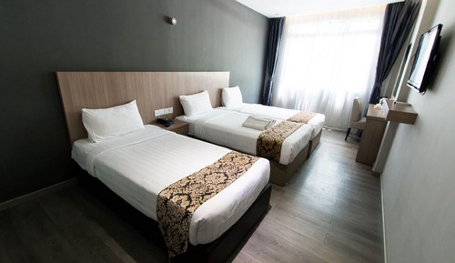 Habitación triple Deluxe