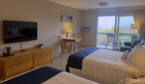 Habitación familiar, varias camas, balcón, vistas al mar