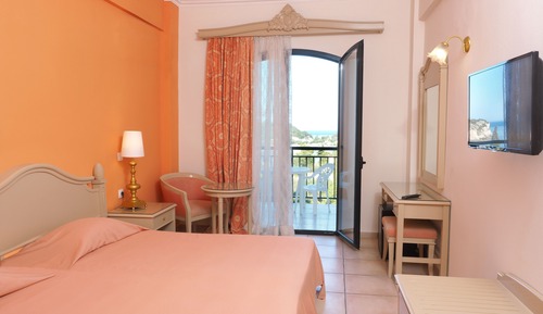 Habitación triple, vistas al mar